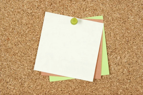 Post-it notes pinned to corkboard — Stock Photo, Image