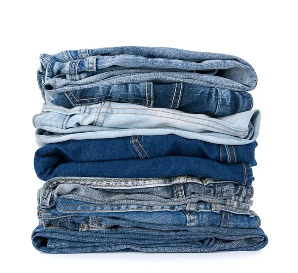 Stack av blå denim kläder — Stockfoto