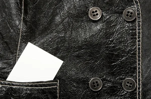 Blank card in a pocket of leather jacket — Stock Photo, Image