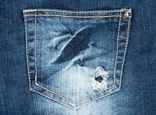 Hole in a pocket of old jeans — Stock Photo, Image