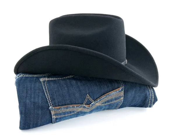 Ковбойская шляпа и синие джинсы — стоковое фото
