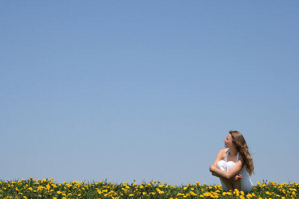 Young woman enjoying fresh air and sun