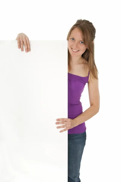 Casual young women holding a blank banner ad — Stock Photo, Image