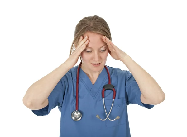 Preoccupied and tired young nurse — Stock Photo, Image