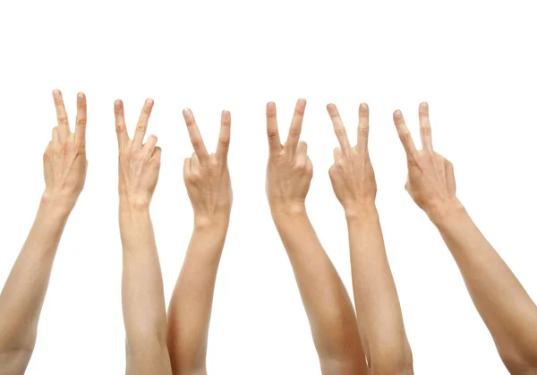 Hands showing victory sign — Stock Photo, Image