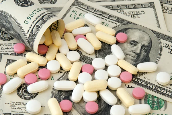 Pills and money Stock Picture