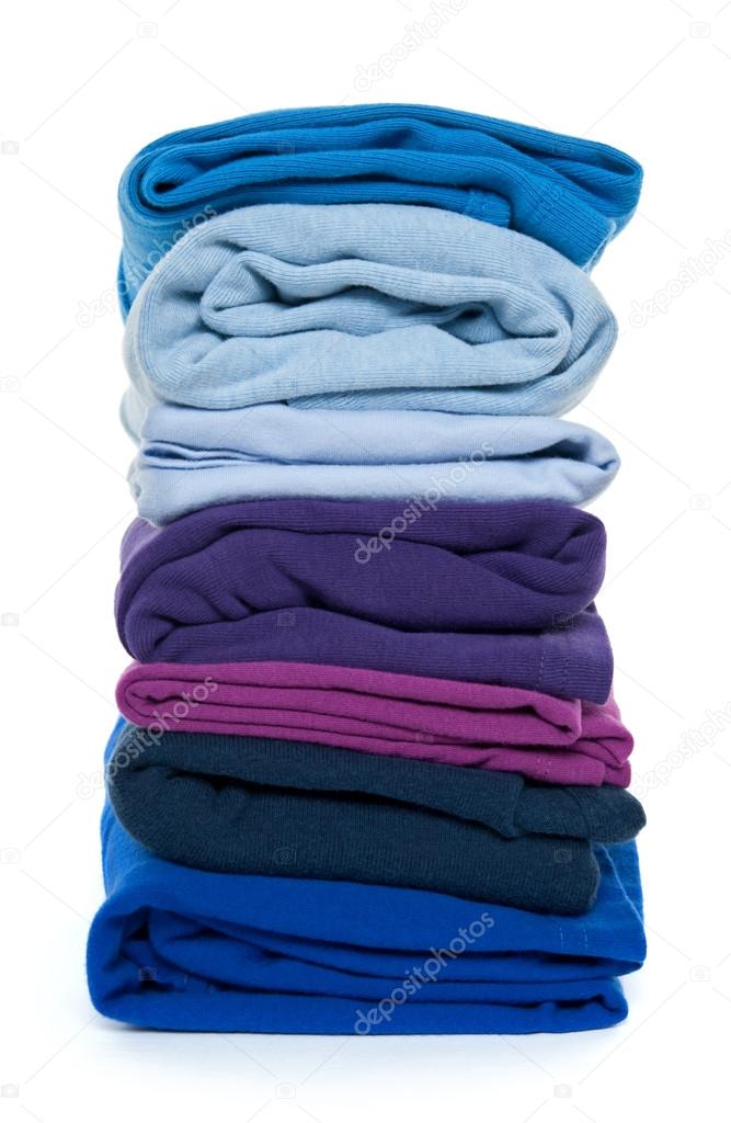 Pile of blue and purple folded clothes