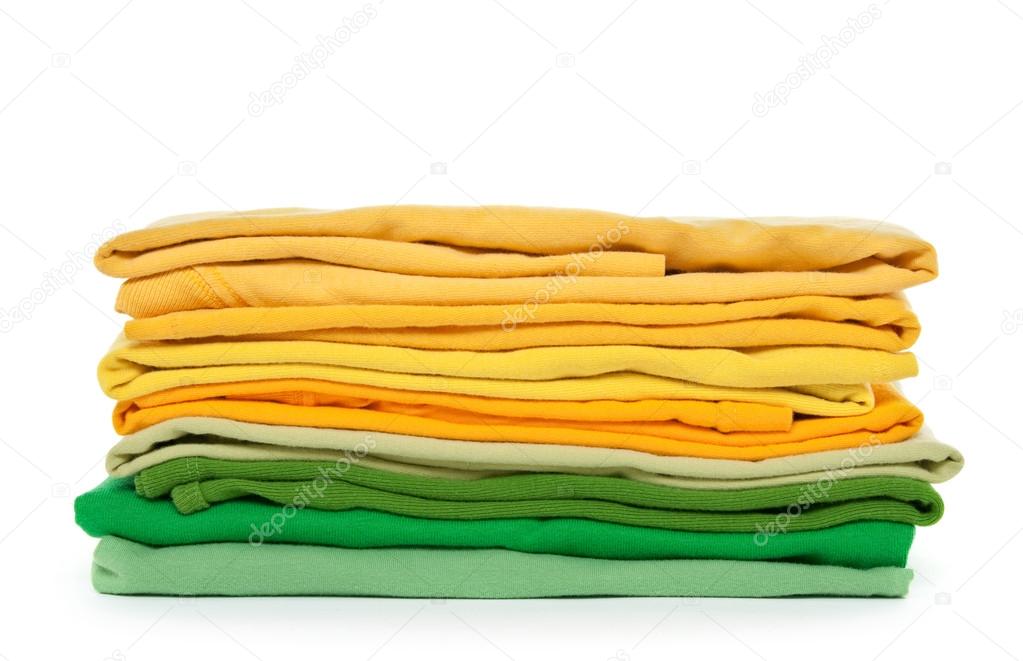 Green and yellow folded clothes
