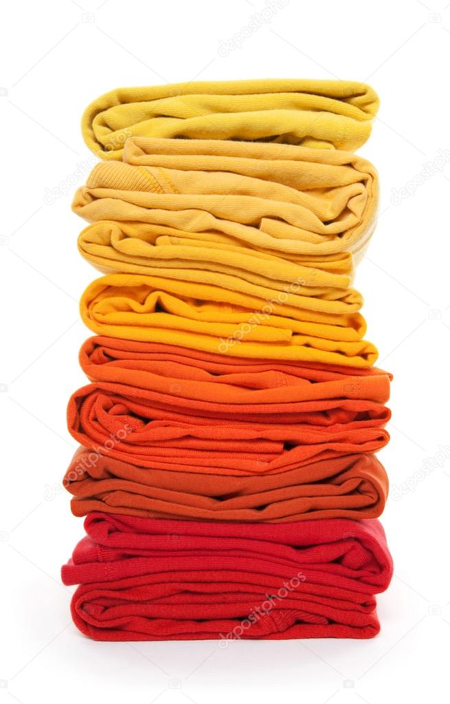Pile of red and yellow folded clothes