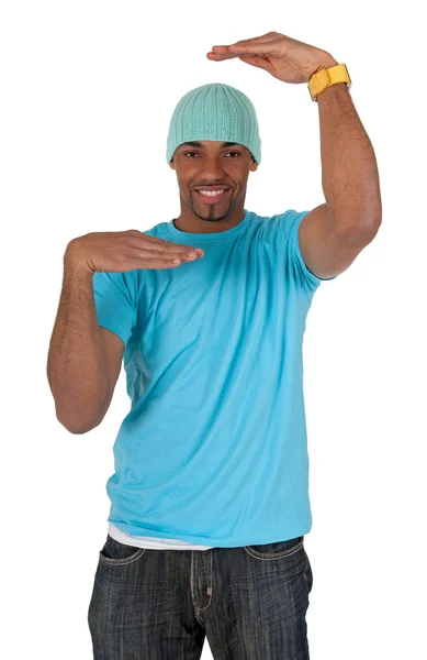 Guy in a blue t-shirt making a frame with his arms Stock Photo