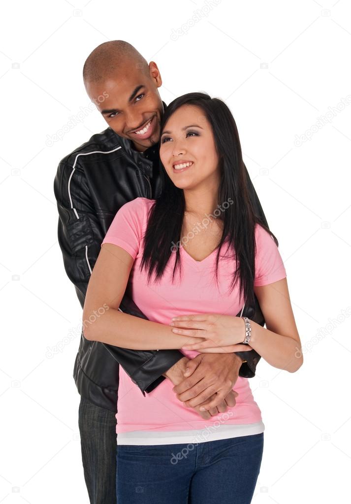 Young loving couple smiling