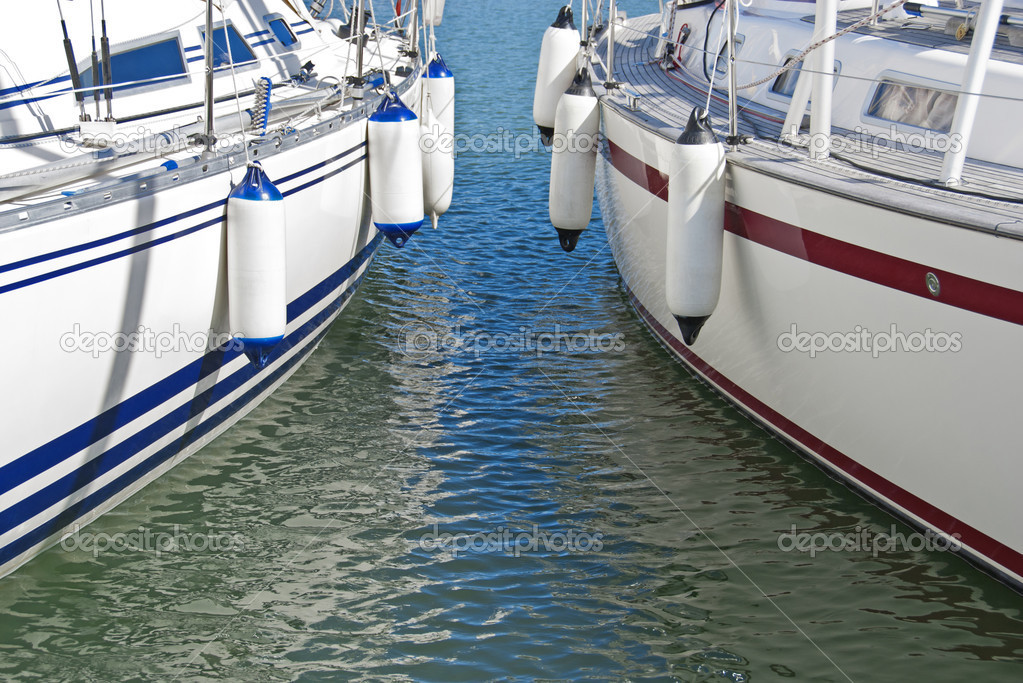 Colorful motorboats on calm water
