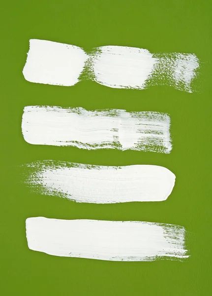 White brush strokes on green background — Stock Photo, Image