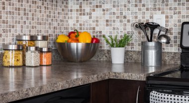 Food ingredients and herbs on kitchen countertop clipart