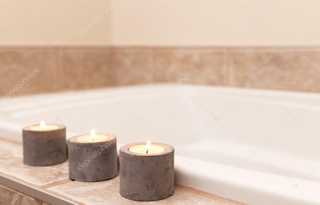 Three candles decorating bathroom