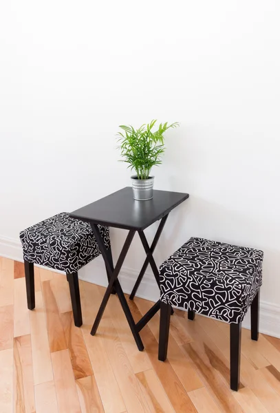 Black table with two chairs — Stock Photo, Image