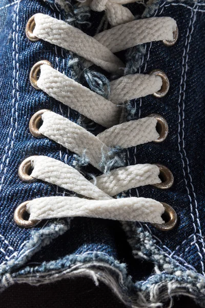 Close-up of denim shoe laces — Stock Photo, Image