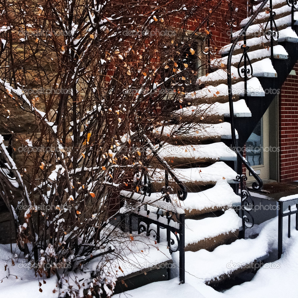 Staircase covered by snow