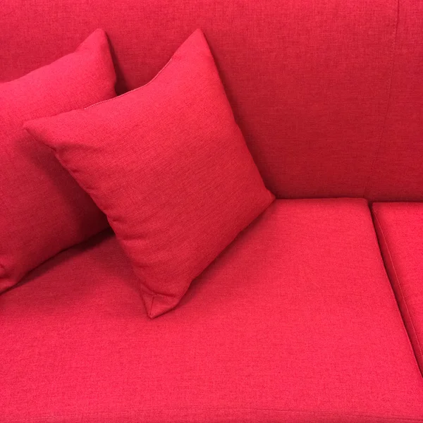 Pink sofa with cushions — Stock Photo, Image