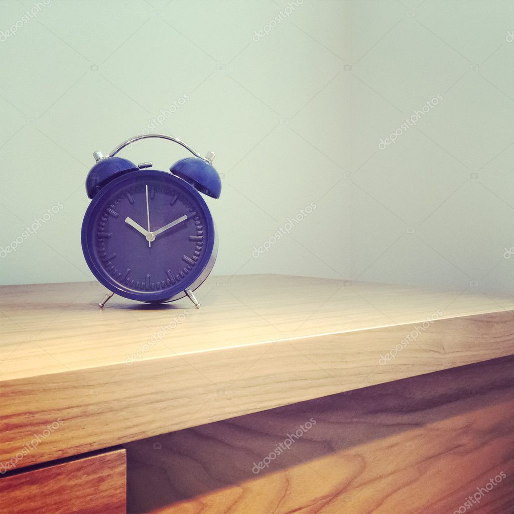 Blue old-fashioned alarm clock — Stock Photo © StudioLightAndShade