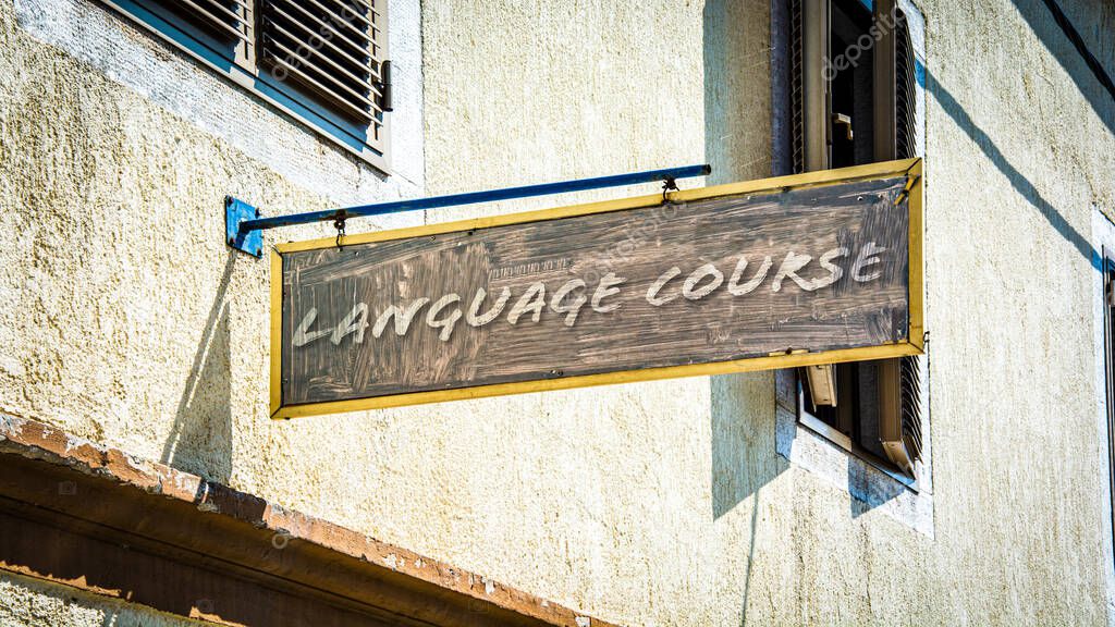 Street Sign the Direction Way to LANGUAGE COURSE