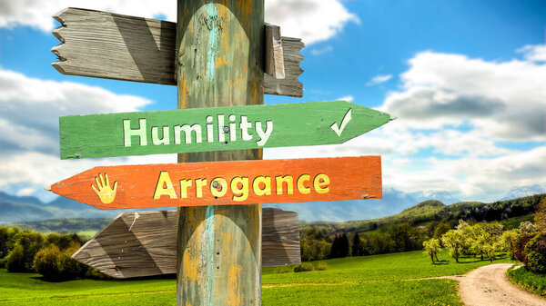 Street Sign the Direction Way to Humility versus Arrogance
