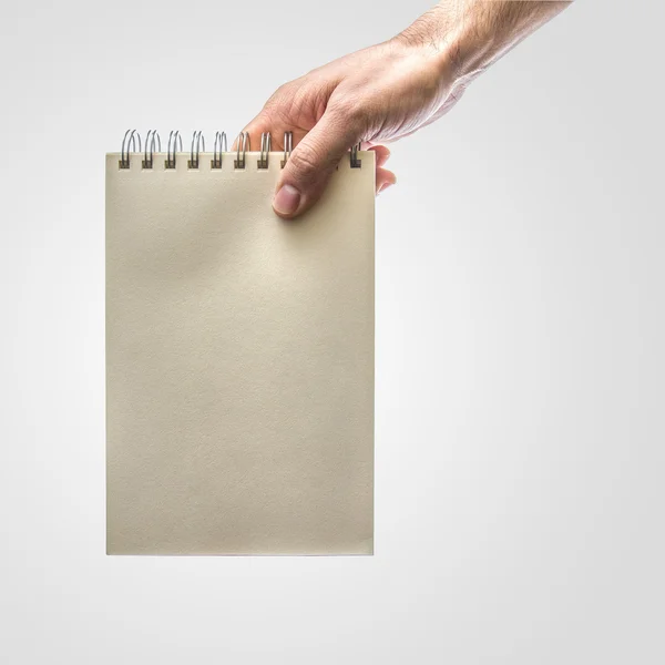 Notizbuch in der Hand — Stockfoto
