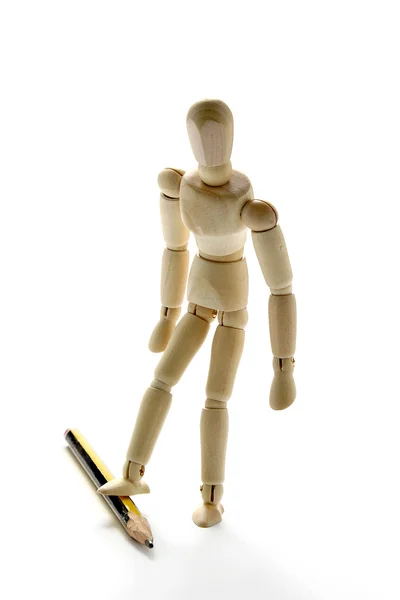 Doll and pencil Royalty Free Stock Photos