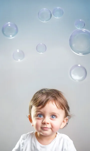 Baby and bubbles — Stock Photo, Image