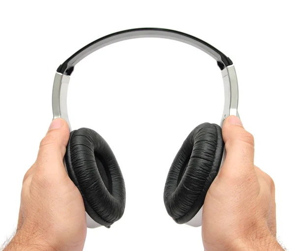 Hands and headphones — Stock Photo, Image