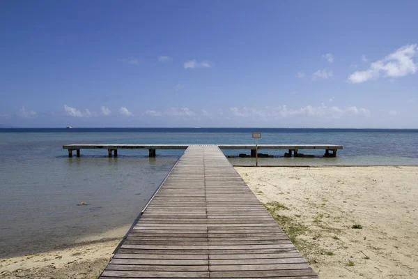 Longo cais oceânico — Fotografia de Stock