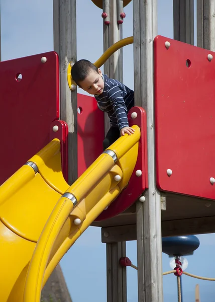 Child on slide — Stock Photo, Image