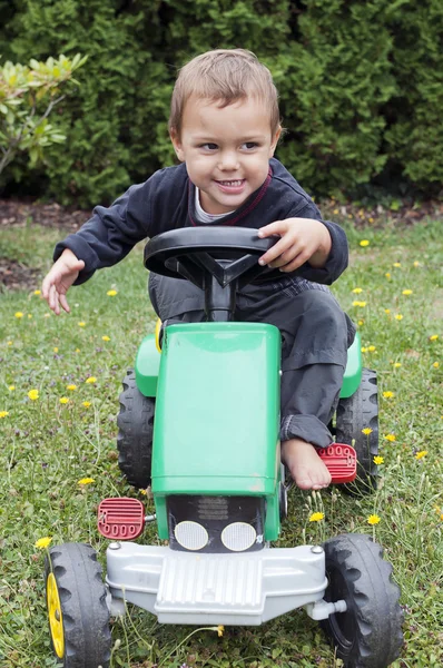 Детский трактор — стоковое фото