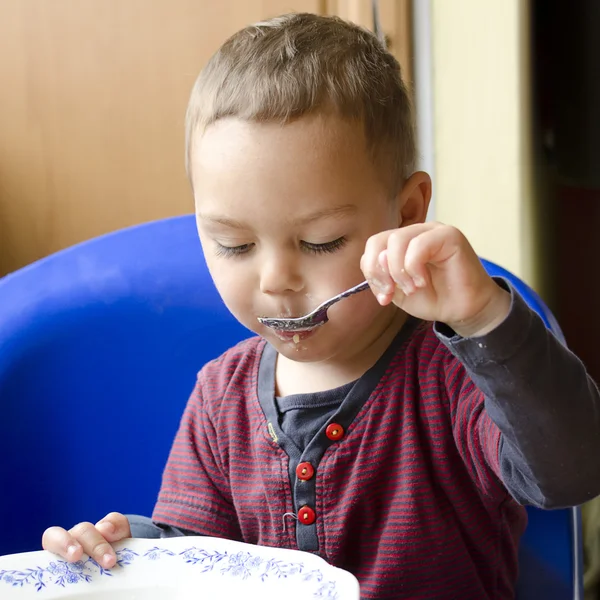 Child eating — Stock Photo, Image