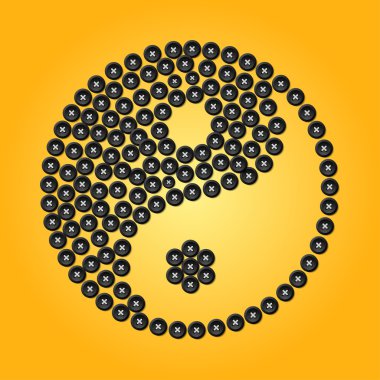 Sarı bir arka plan üzerinde ortaya konulan yin-yang düğmeleri
