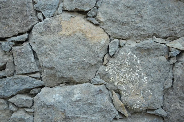 Steinmauer Hintergrund lizenzfreie Stockbilder