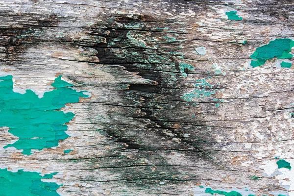 Tinta descascada sobre placa de madeira . — Fotografia de Stock