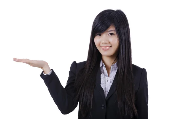 Woman gesturing or showing. Businesswoman in suit smiling lookin — Stock Photo, Image