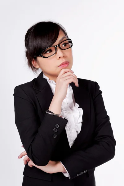 Young business woman thinking — Stock Photo, Image