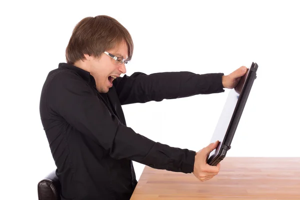 Geschäftsmann versucht seinen Laptop zu zerstören — Stockfoto