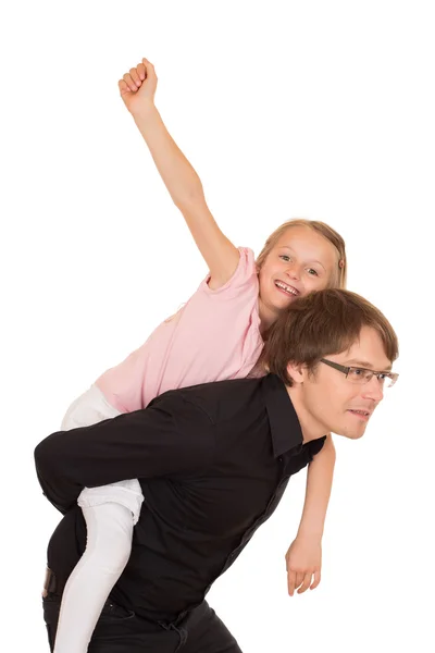 Pai dando passeio de piggyback para sua filha — Fotografia de Stock