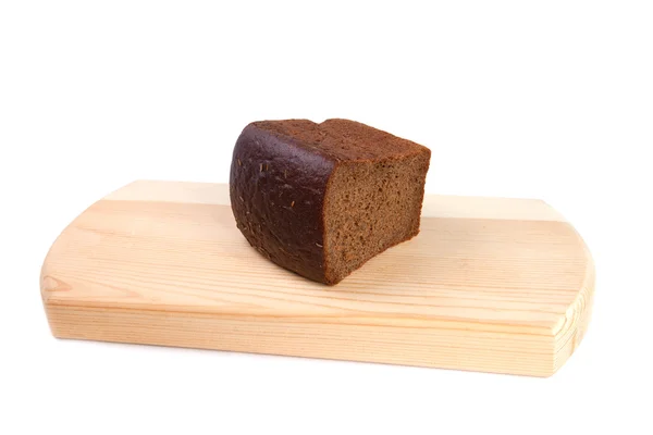 Pão e placa de corte — Fotografia de Stock