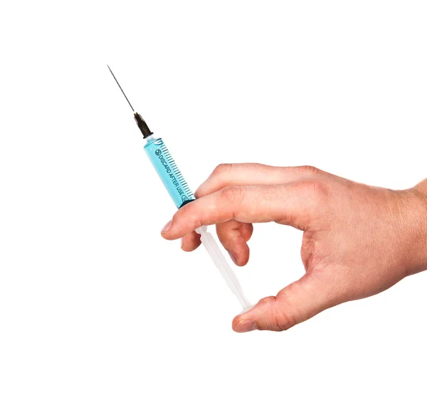 A man holding a syringe — Stock Photo, Image