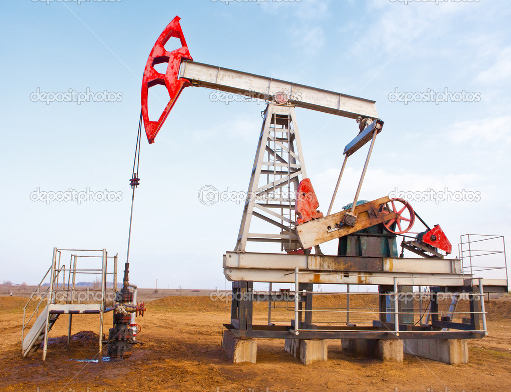 Oil pump on a background of blue sky