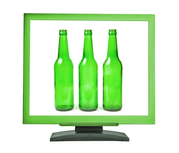 Botellas de vidrio en una pantalla verde — Foto de Stock