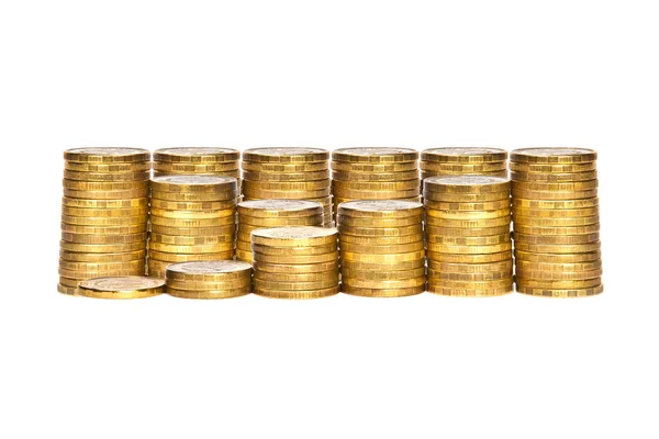 Montones de monedas sobre fondo blanco — Foto de Stock