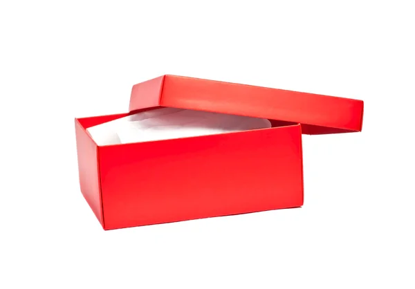 A caixa vermelha aberta em um fundo branco — Fotografia de Stock