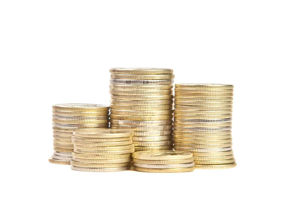 Staplar med mynt på en vit bakgrund — Stockfoto