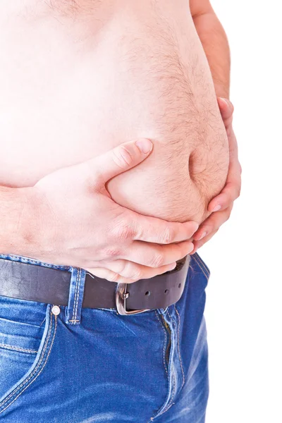 Um homem agarrado à barriga grande — Fotografia de Stock