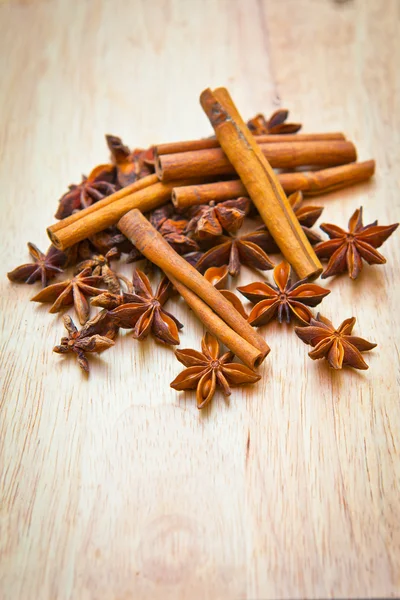 Vanilla sticks and star anise on a wooden board — Stock Photo, Image